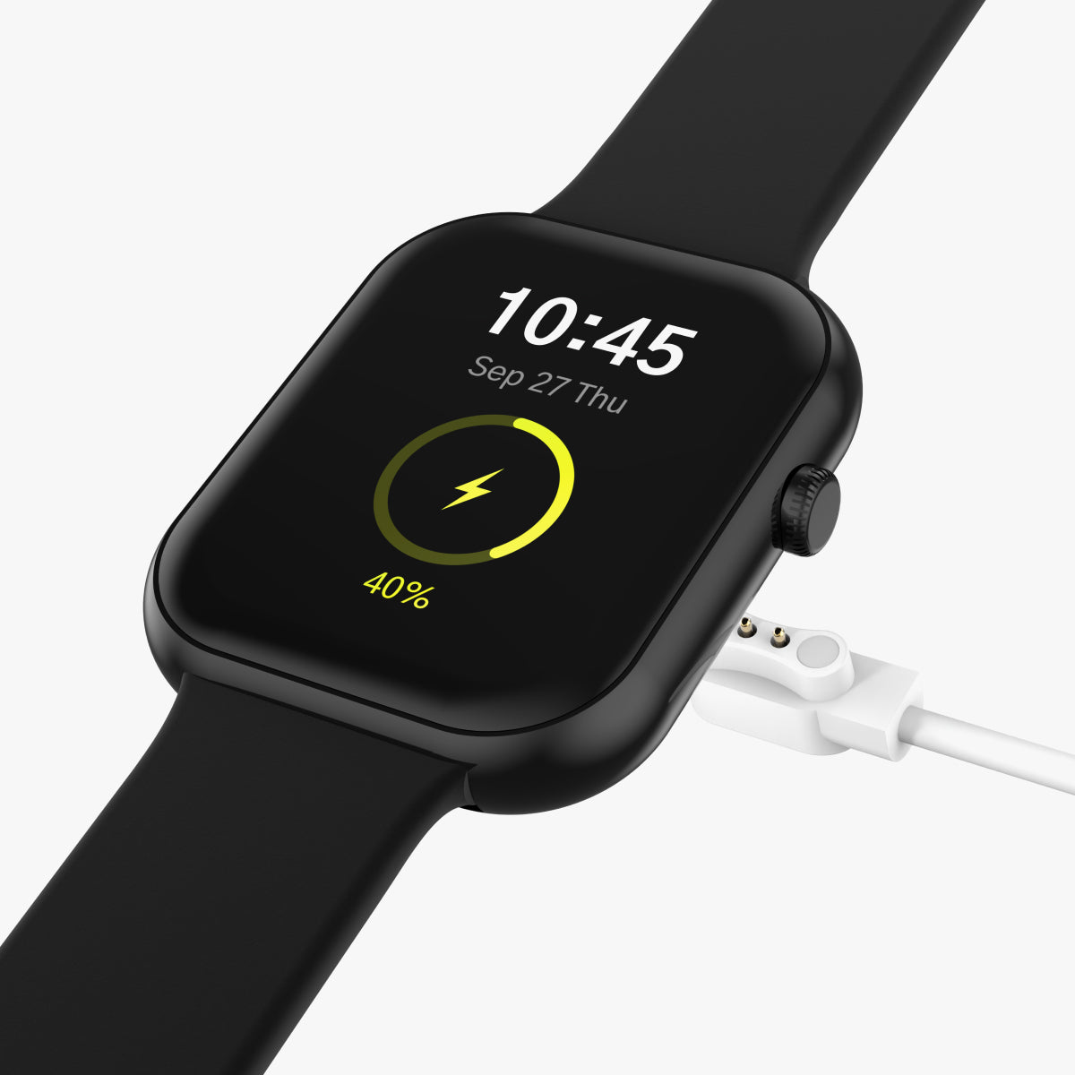Black smartwatch with charging cable on a white background